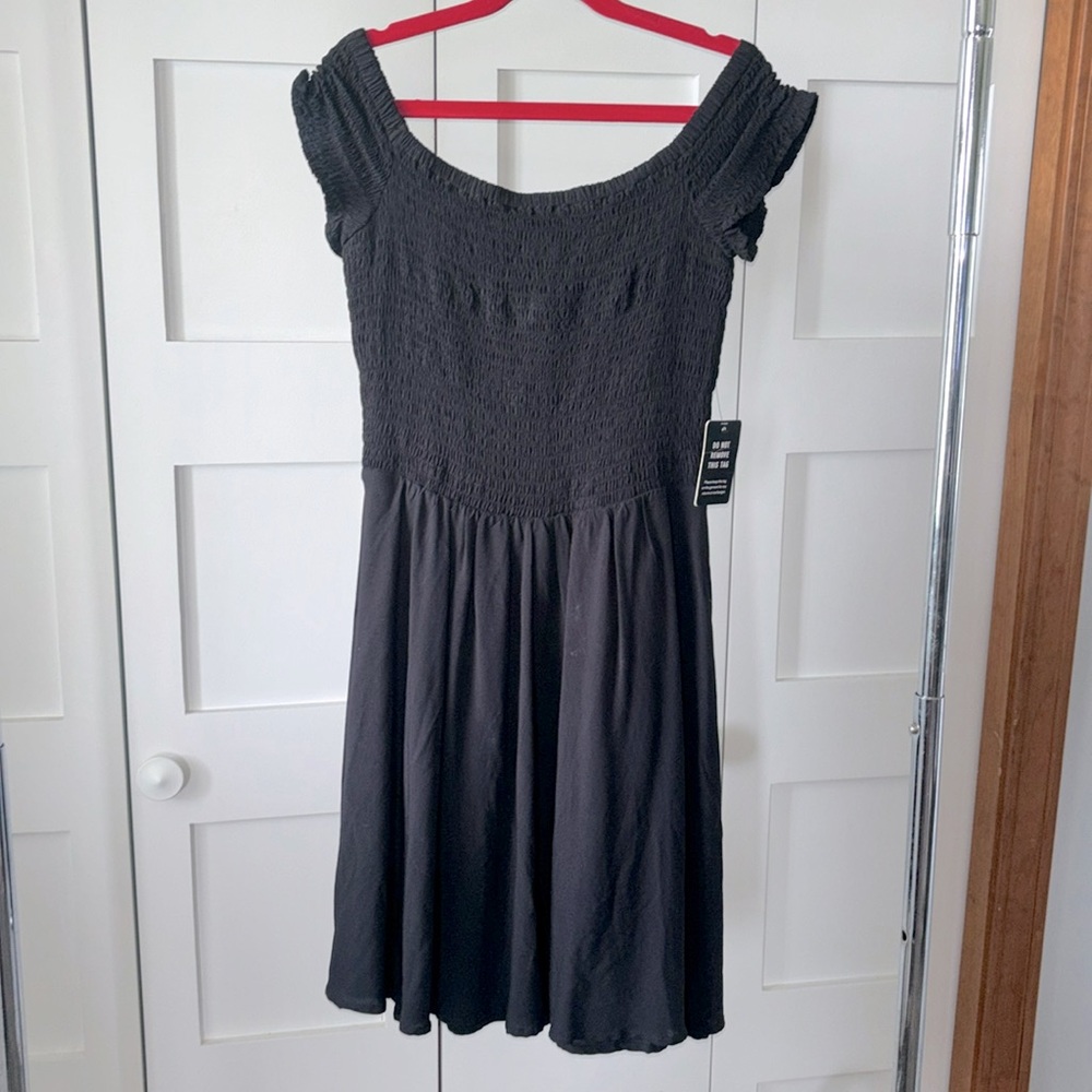 Express woman’s size XS black dress with ribbed top half